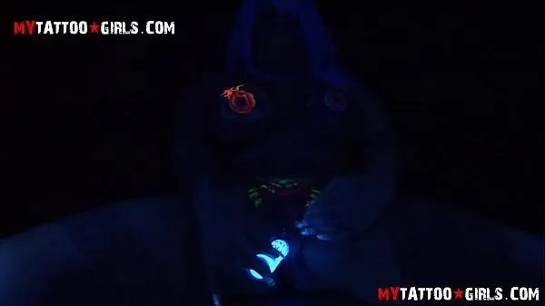 masturbating and showing glowing tattoos