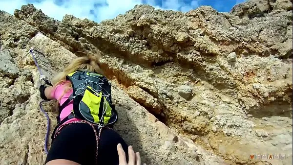 Watch Blonde Alpinist Climbs on a Hard Rod on the Beach energy Movies