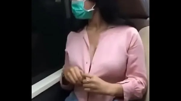 Watch Damned brunette showed her breasts on the train energy Movies